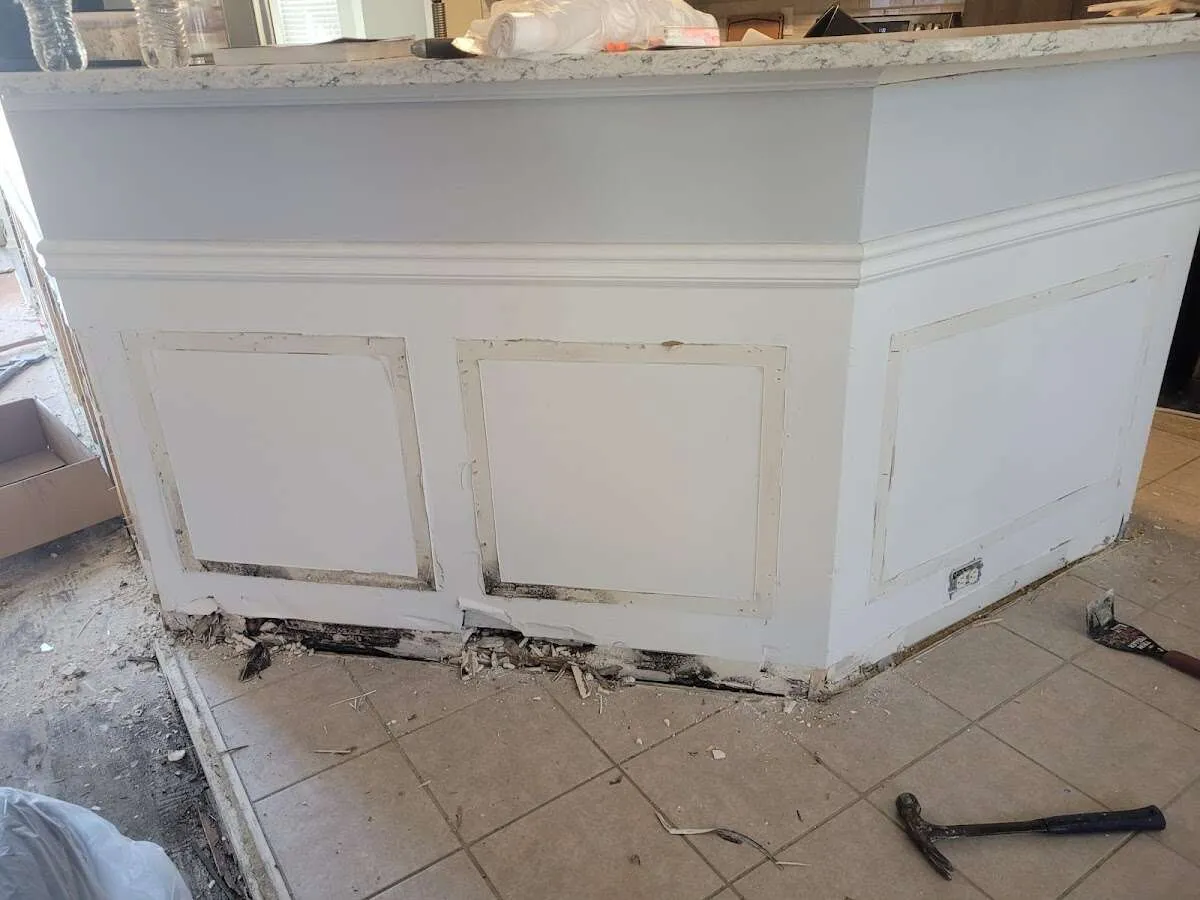 Water damage and mold on kitchen during Storm Damage Restoration in Norwich